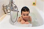 Boy taking a bath