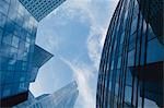 Facade of modern office buildings against sky, directly below