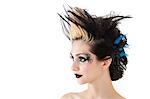 Close-up of beautiful gothic woman with spiked hair and face painting over white background