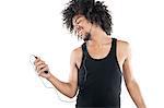 Happy young man listening to mp3 player over white background