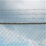 Chain Link Fence and Barbed Wire