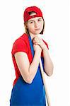 Sad teenage girl in her work uniform, leaning on her mop or broom.