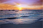 Vivid sunset over the harbor in the Maldives