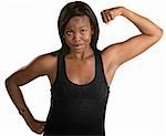 Smiling Black woman flexes her bicep over white background