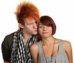 Young man with mohawk kisses mixed girlfriend over white