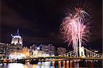 Fireworks on the Allegheny river in downtown  Pittsburgh, Pennsylvania, USA.