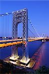 The George Washington Bridge spans the Hudson River from Fort Lee, New Jersey to the Washington Heights neighborhood in the borough of Manhattan in the city of New York, New York.