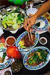 High angle view of various Thai food on table