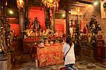 People worshipping in the Chinese temple, Wanchai, Hong Kong