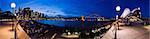 People drinking in the opera house bar at dusk, Sydney Opera House, Harbour Bridge and skyline, Sydney, New South Wales, Australia, Pacific