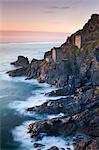 Remains of The Crowns tin mine engine houses on the Cornish Atlantic coast near Botallack, St. Just, Cornwall, England, United Kingdom, Europe