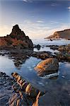 Rockpools and jagged rocks at Duckpool beach in North Cornwall, England, United Kingdom, Europe