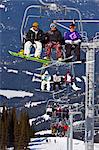 Chairlift carrying skiers and snowboarders, Whistler Mountain, Whistler Blackcomb Ski Resort, Whistler, British Columbia, Canada, North America