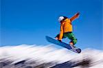 Snowboarder flying off a ramp, Whistler Mountain, Whistler Blackcomb Ski Resort, Whistler, British Columbia, Canada, North America