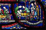 Medieval stained glass depicting the Plague in the House of Jordan Fitz-Eisulf, Becket Miracle Window 6, Trinity Chapel Ambulatory, Canterbury Cathedral, UNESCO World Heritage Site, Canterbury, Kent, England, United Kingdom, Europe