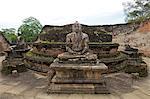 One of the Buddha statues on the upper platform, next to the stupa, Vatadage, Polonnaruwa, UNESCO World Heritage Site, Sri Lanka, Asia