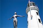 The Diving Belle Sculpture and Lighthouse on Vincents Pier, Scarborough, North Yorkshire, Yorkshire, England, United Kingdom, Europe