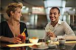 Couple having drinks at bar