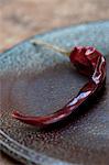 Close up of dried red chili on plate