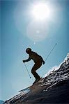 Skier coasting on snowy slope