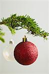 Christmas baubles hanging from Christmas tree