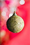 Glittered golden Christmas bauble