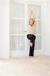 Mature woman practicing yoga