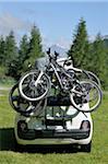 Bicycles Loaded onto Back of Car