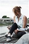 Teenage Girl Reading Text Message, Mannheim, Baden-Wurttemberg, Germany