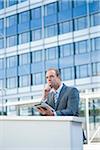 Businessman using Tablet PC, Niederrad, Frankfurt, Germany