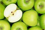 Group of green apples forming a background