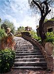 Stairs in old romantic blossoming garden, Sicily