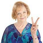 Cute elderly woman in blue with peace hand gesture