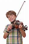 Young boy plays violin on white background