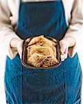 Person Holding a Small Metal Dish of Mini Blackberry Tarts