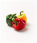 Red, green and yellow peppers