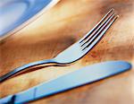 Cutlery on a wooden surface