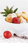 Strawberry doughnuts in a bowl