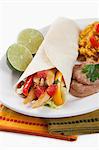 Chicken Fajita on a Flour Tortilla; Refried Beans and Rice