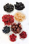 Various berries in a glass bowls