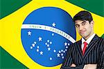 Portrait d'un homme d'affaires indien confiant contre drapeau brésilien
