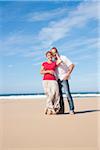 Portrait of Mature Couple Hugging on the Beach, Camaret-sur-Mer, Crozon Peninsula, Finistere, Brittany, France