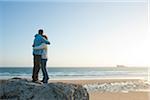 Mature Couple Hugging on the Beach, Camaret-sur-Mer, Crozon Peninsula, Finistere, Brittany, France