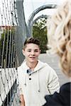 Girl and Boy Talking in Playground, Mannheim, Baden-Wurttemberg, Germany