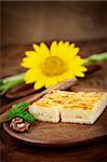 Cheese pie. Pastry cake with cheese on wooden background.