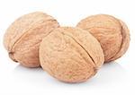 Closeup of three walnuts isolated on white background