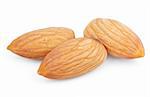 Closeup of three almond nuts isolated on white