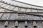 Railway track junction on a gravel bed.