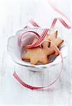 gingerbread cookies with check ribbon in a bowl