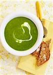 Overhead View of Green Soup with Buttered Toast